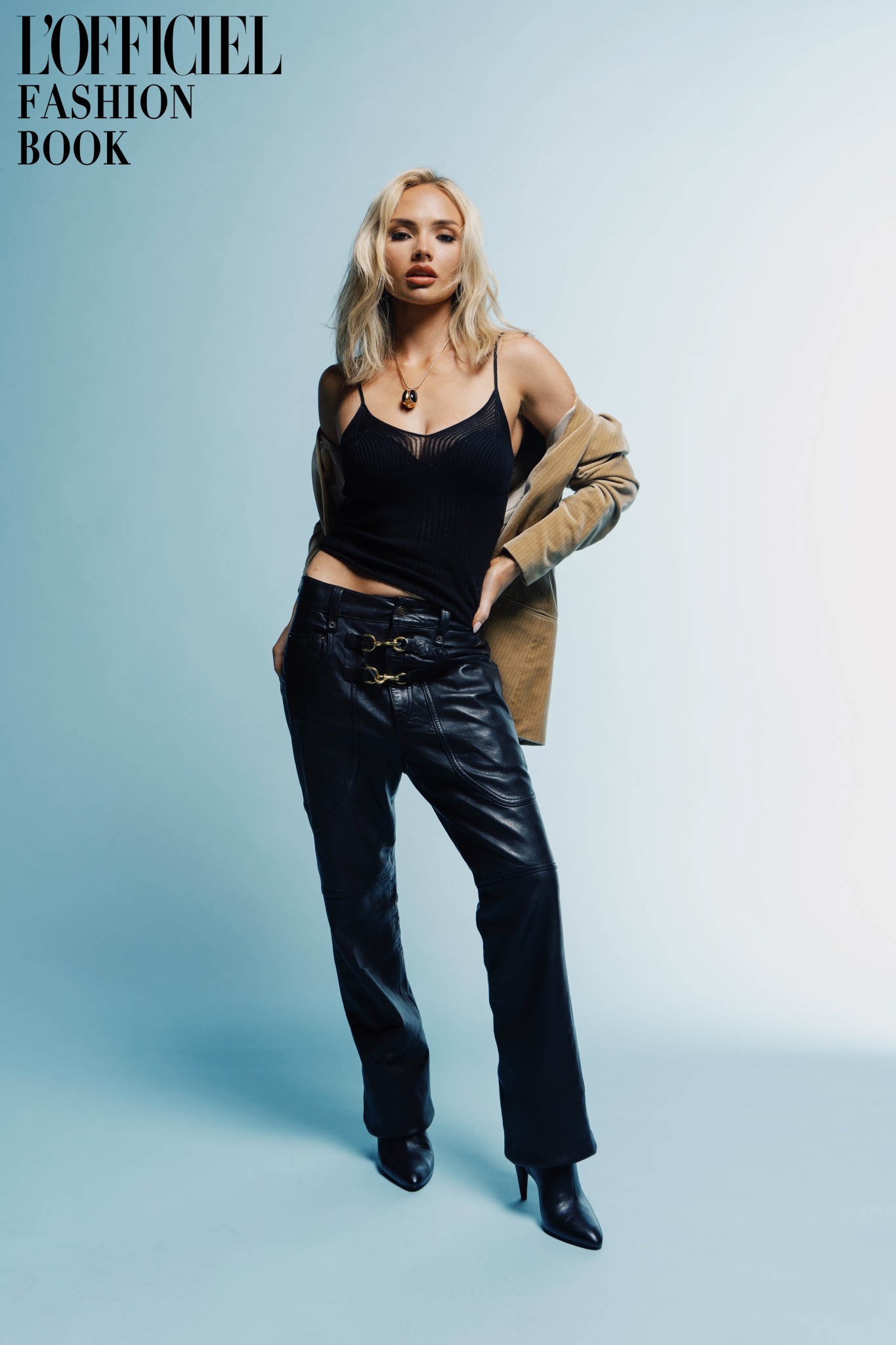Full Look: Isabel Marant
Necklace: Isabel Marant
Earrings: Gabriela Artigas
Boots: Manolo Blahnik